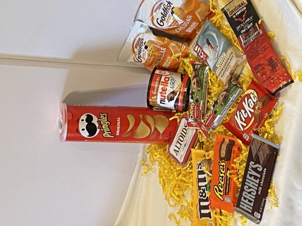 Snack  Attack Package  (Lays Stax/Pringles, 1 Clif Bar, 2 Granola Bars, 4 Assorted Candy Bars, 1 Nutella, 4 Goldfish, 4 Bags of Microwave Popcorn, 1 Beef Stick, 1 Pack of Gum) *No yellow crinkle paper
